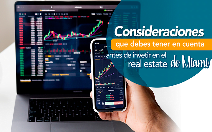 Mano sosteniendo smartphone con graficos financieros y laptop - consideraciones antes de invertir en real estate Miami