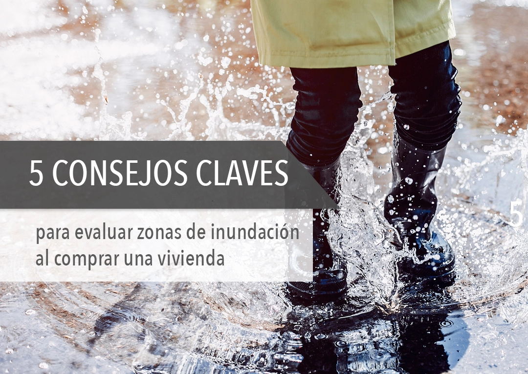 Persona con botas de lluvia caminando en agua - 5 consejos para evaluar zonas de inundacion al comprar vivienda