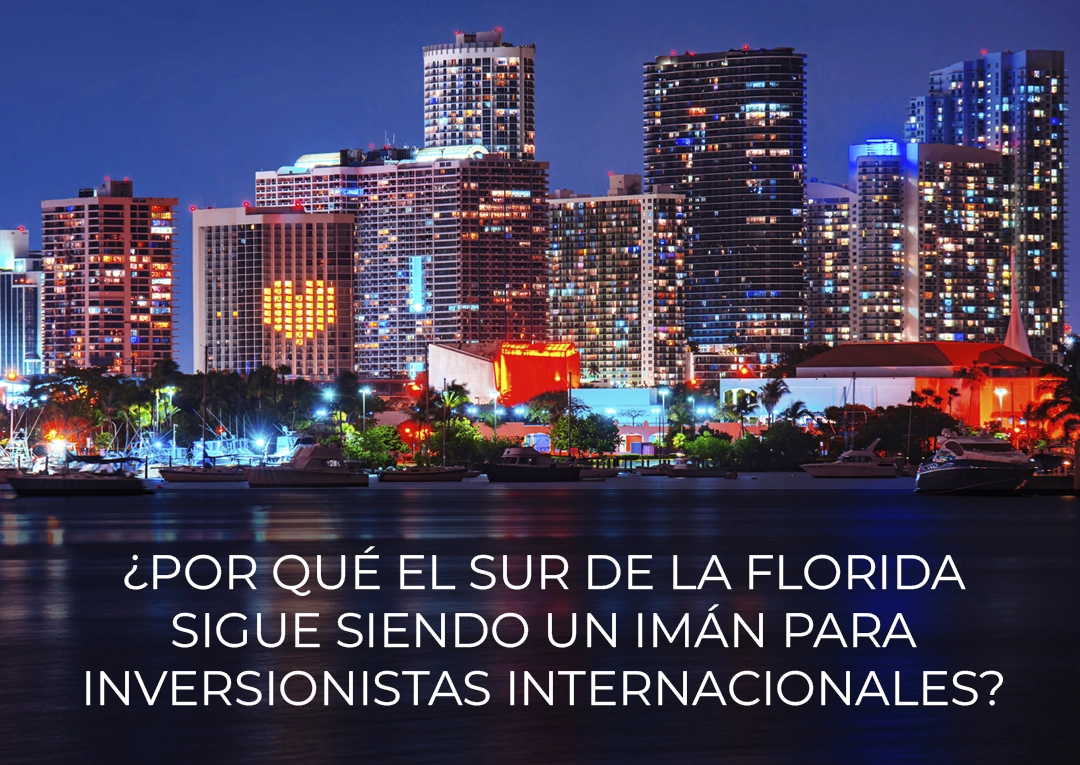 Skyline nocturno de Miami con luces reflejadas en el agua - sur de la Florida iman para inversionistas internacionales