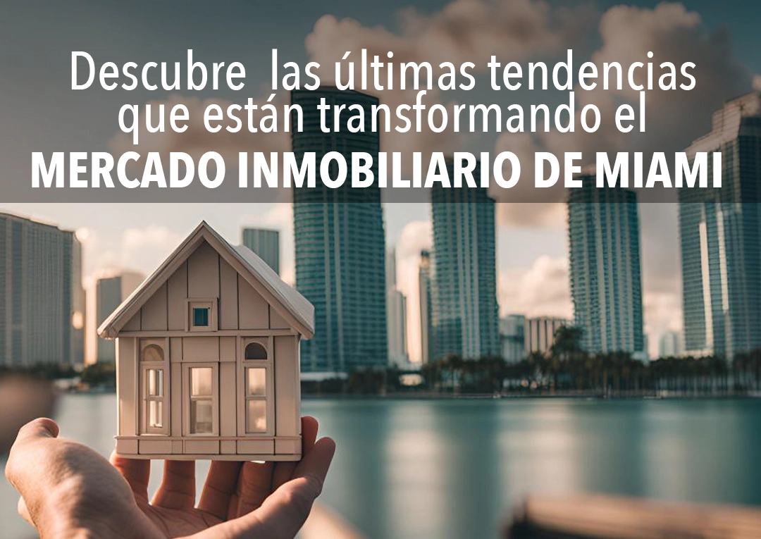 Mano sosteniendo casa en miniatura frente al skyline de Miami - ultimas tendencias del mercado inmobiliario